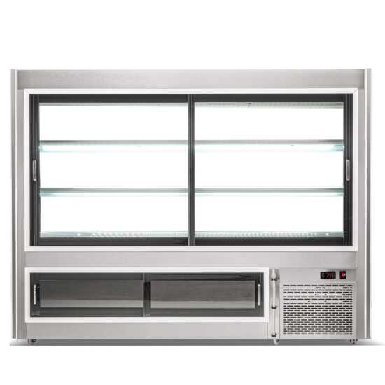 72-inch refrigerated deli case with slanted glass for clear product display and rear storage for easy restocking. Perfect for showcasing and preserving meat products in retail settings.