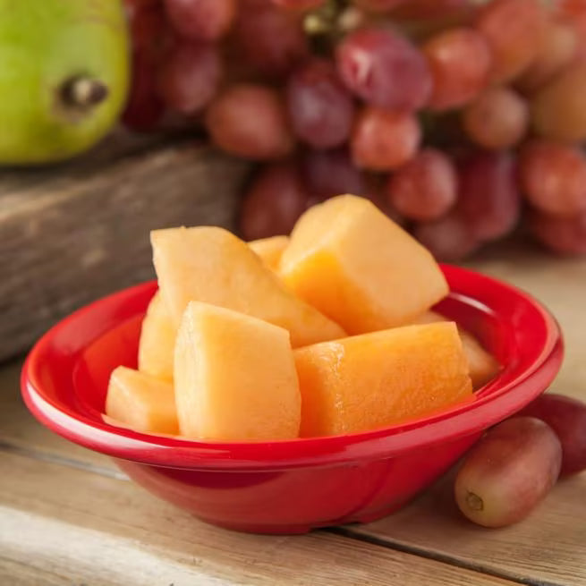 Serve fruit, desserts, and side dishes with confidence using the KL80505 Red Melamine Rimmed Fruit Bowl. This 4.75 oz break resistant bowl is ideal for restaurants, cafeterias, catering services, and home dining.