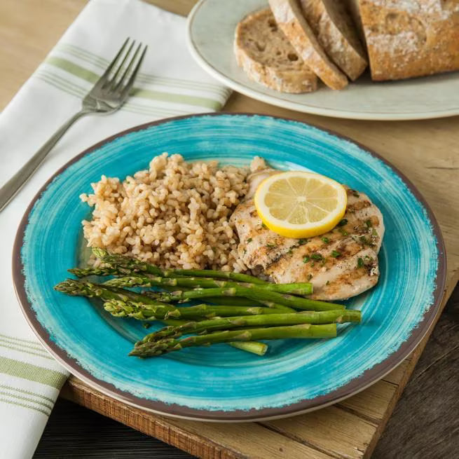 Serve meals with style using the 5400115 Aqua Melamine Dinner Plate. This 11 Inch break resistant plate features a rustic pottery inspired design, making it ideal for restaurants, catering, buffets, and home dining.