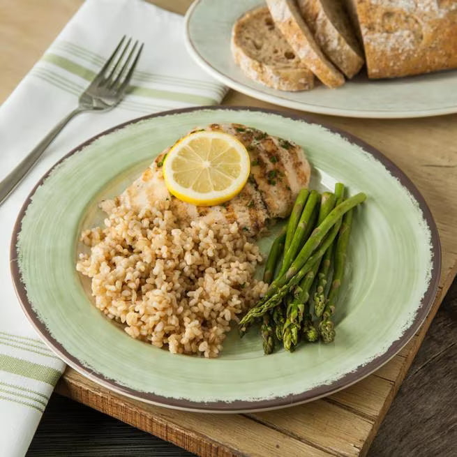 Serve meals with style using the 5400146 Jade Melamine Dinner Plate. This 11 Inch break resistant plate features a rustic pottery inspired design, making it ideal for restaurants, catering, buffets, and home dining.