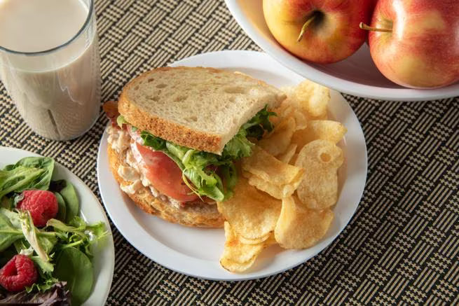 Serve sandwiches, desserts, and appetizers with the KL20102 White Melamine Sandwich Plate. This 7.25 Inch break resistant melamine plate is ideal for restaurants, cafeterias, catering services, and home dining.