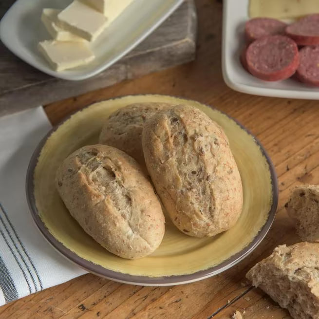 Serve bread, pastries, and desserts with style using the 5400713 Amber Melamine Bread and Butter Plate. This 7 Inch break resistant plate features a rustic pottery inspired design, making it ideal for restaurants, catering, buffets, and home dining.