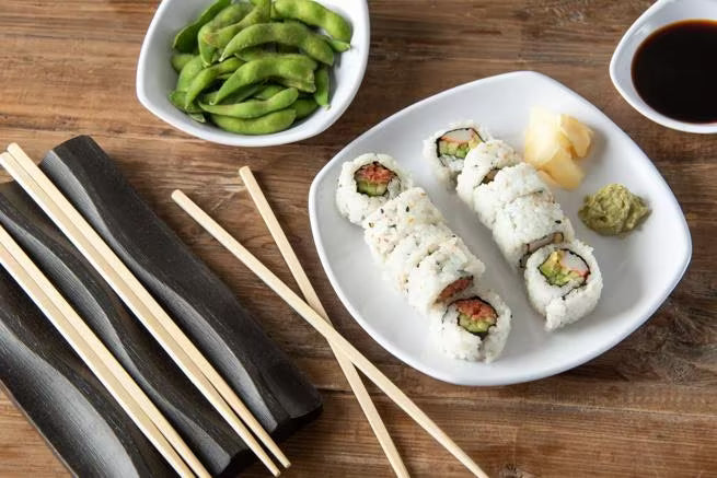 7.75 Inch White Melamine Upturned Corner Small Square Plate with commercial grade durability, shatter resistant construction and a modern square design. Perfect for salads, appetizers, egg rolls, spring rolls and desserts.