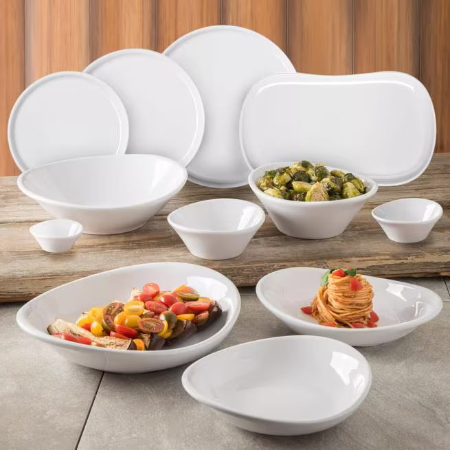 9 Inch White Stadia Melamine Salad Plate with commercial grade break resistant construction and a modern organic shape. Perfect for serving salads, appetizers, desserts, bread and side dishes.