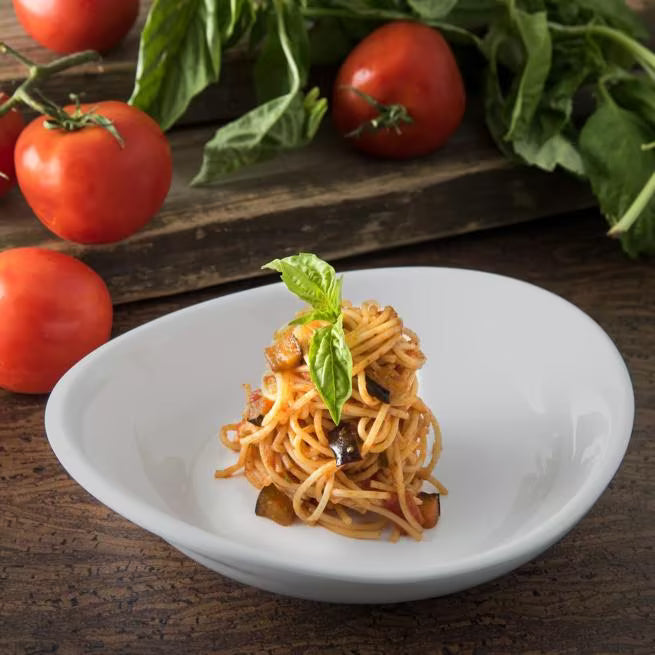 9.5 Inch Greige Stadia Melamine Pasta Plate with commercial grade break resistant construction and a modern organic shape. Perfect for serving pasta, risotto, salads, grain bowls and specialty entrees.