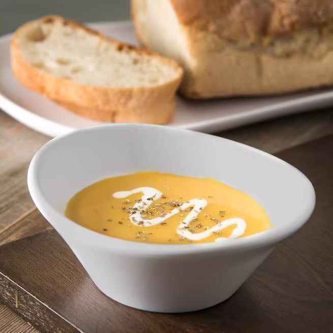 12 oz Greige Stadia Melamine Bowl with commercial grade break resistant construction and a modern organic shape. Perfect for serving soups, salads, cereals, pasta, grain bowls, desserts and side dishes.