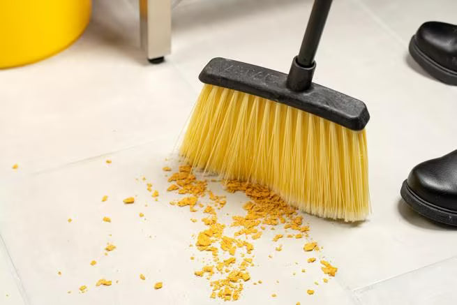 36 Inch Natural Duo-Sweep Flagged Lobby Broom with a black metal handle, angled brush head and flagged synthetic bristles. Designed for efficient commercial sweeping of fine dust and debris in hard to reach areas.