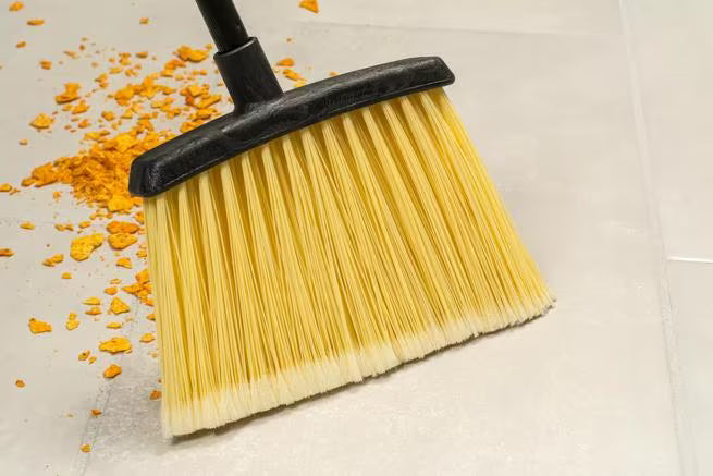 36 Inch Natural Duo-Sweep Flagged Lobby Broom with a black metal handle, angled brush head and flagged synthetic bristles. Designed for efficient commercial sweeping of fine dust and debris in hard to reach areas.
