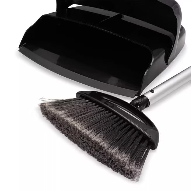 Black Duo-Pan Upright Dust Pan and Broom Set with a space-saving nesting design, adjustable broom head, low-profile dust pan edge and frayed bristles for efficient commercial cleaning.