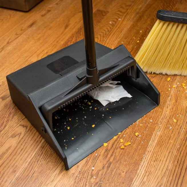 Black Lobby Dust Pan with a 30 Inch two-piece handle, serrated comb edge and hanging hole for efficient commercial debris collection. Compatible with Carlisle lobby dust brooms and Duo-Pan systems.