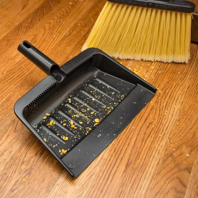 12 x 8 Inch Black Flo-Pac Flexible Plastic Dustpan with a durable construction, comfortable finger grip handle and threaded handle compatibility for commercial floor cleaning.