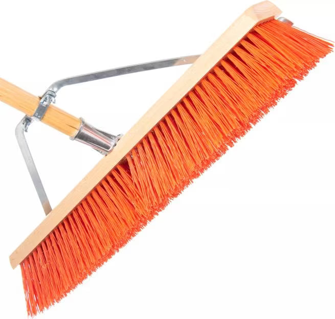 24 Inch Orange Flo-Pac Polypropylene Floor Sweep with a steel scraper blade for removing caked-on debris. Includes handle, brace and handle connection for heavy duty commercial and industrial cleaning.