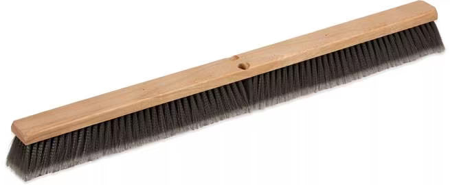 Shop the Flo-Pac 36 Inch Gray Flagged Polypropylene Sweep with soft flagged polypropylene bristles and a durable wood block. Ideal for sweeping dust and fine particles on hard, smooth surfaces.