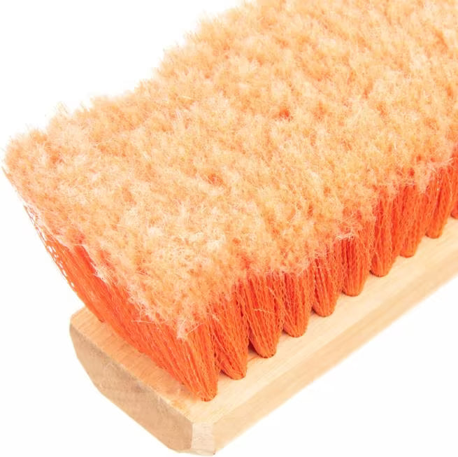 Shop the Flo-Pac 36 Inch Orange Flagged Polypropylene Sweep with soft flagged polypropylene bristles and a durable wood block. Ideal for sweeping dust and fine particles on hard, smooth surfaces.