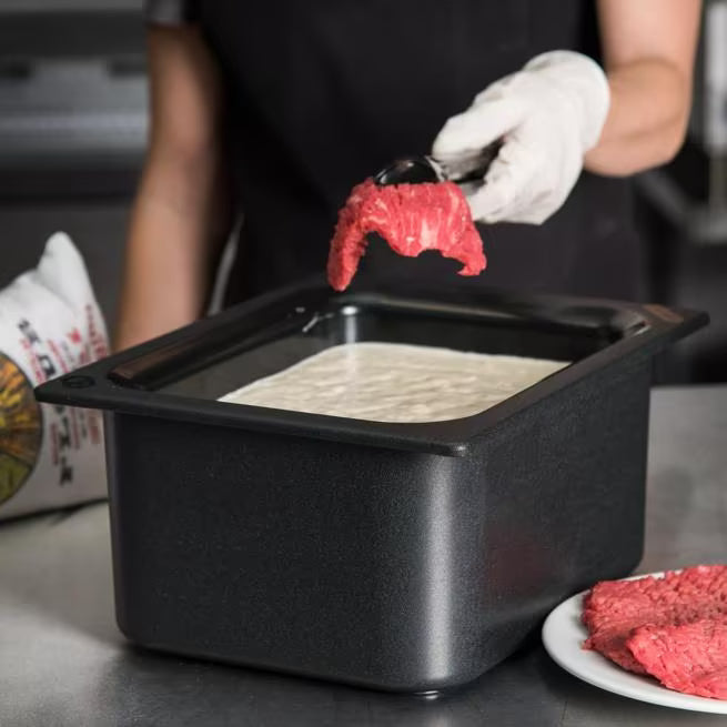 Keep cold foods safely chilled with the Half Size Black Coldmaster Food Pan 6 Quart CM110103. This insulated gel filled food pan maintains temperatures for up to 8 hours without ice and is ideal for restaurants, buffets, catering operations, and commercial kitchens.