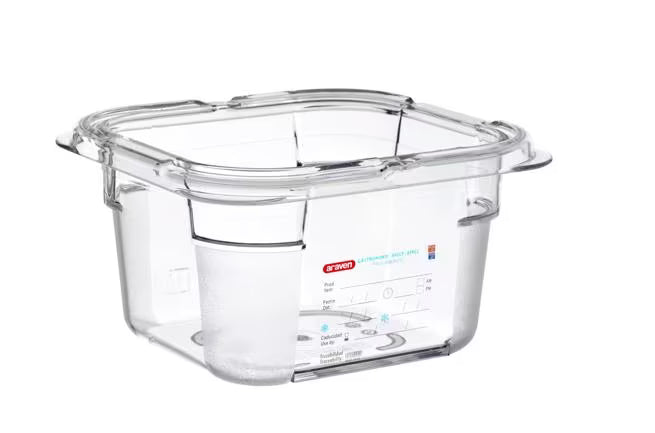 Organize food storage with the GN 1/6 Size 4 Inch Deep Clear Polycarbonate Food Pan 09797. Features an integrated traceability label, measuring scale, rounded edges and stain-resistant construction.