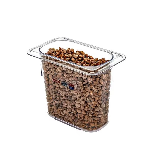 Organize food storage with the GN 1/9 Size 6 Inch Deep Clear Polycarbonate Food Pan 09838. Features an integrated traceability label, measuring scale, rounded edges and stain-resistant construction.