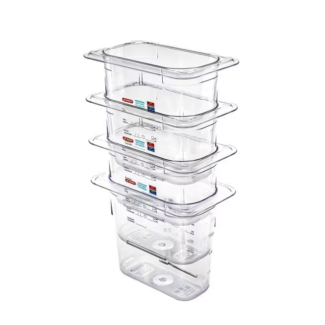 Organize food storage with the GN 1/9 Size 6 Inch Deep Clear Polycarbonate Food Pan 09838. Features an integrated traceability label, measuring scale, rounded edges and stain-resistant construction.