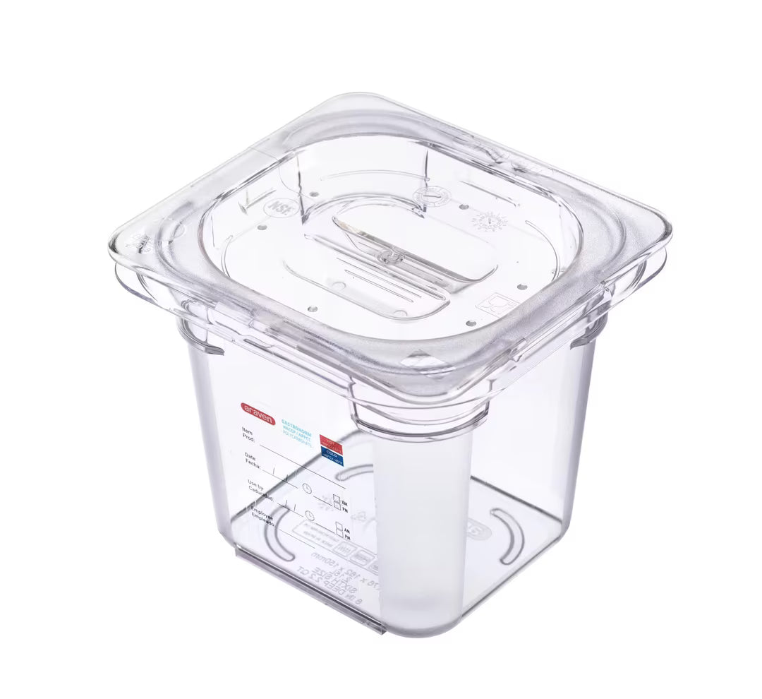 Organize food storage with the GN 1/6 Size 6 Inch Deep Clear Polycarbonate Food Pan 09839. Features an integrated traceability label, measuring scale, rounded edges and stain-resistant construction.