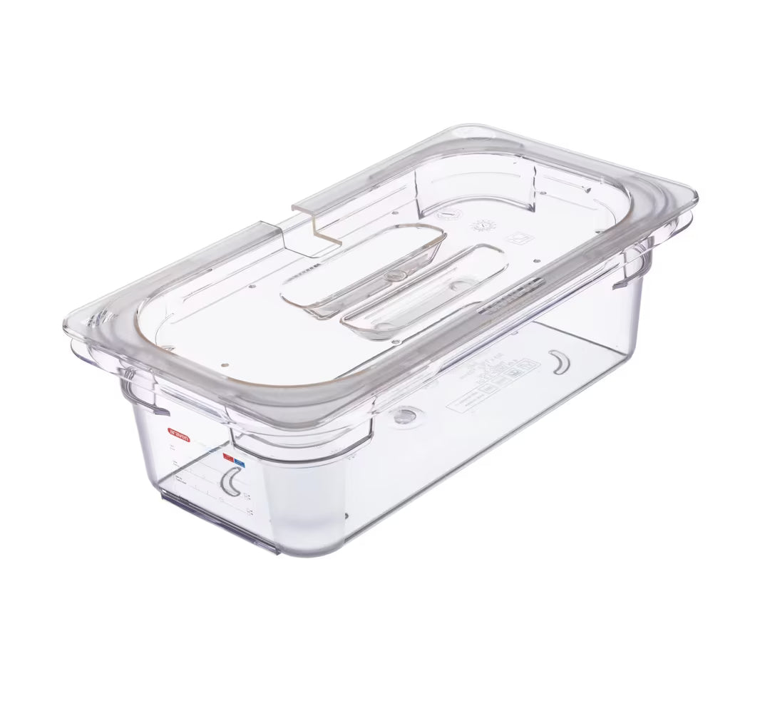 Protect and serve food efficiently with the GN 1/3 Size Notched Clear Polycarbonate Contact Lid 84029. Features a universal fit, integrated handle, utensil rest, and reduced air exposure.