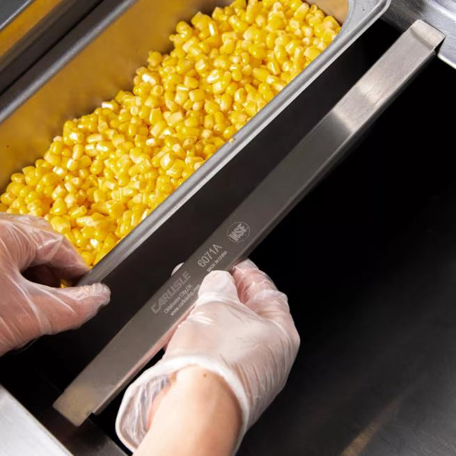 Support full-size food pans with the DuraPan Stainless Steel Steam Table Hotel Pan Adapter Bar 6071A. Features durable stainless steel construction, a 12.75 inch length, and a specific fit for full-size pans.