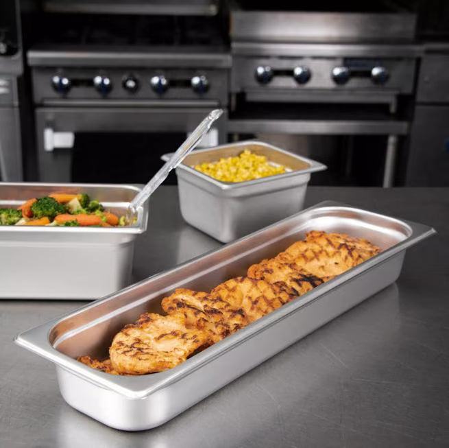 Prepare and serve food efficiently with the DuraPan Light Gauge Stainless Steel Steam Table Long Hotel Pan Long 1/2 Size 2.5 Inch Deep 60700HL2. Features spoonable bottoms, freezer-to-oven versatility, and Coldmaster compatibility.