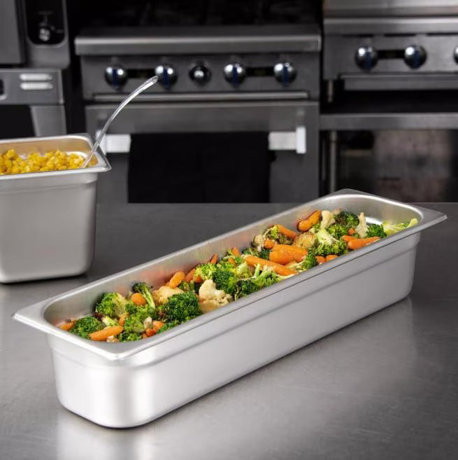 Prepare and serve food efficiently with the DuraPan Light Gauge Stainless Steel Steam Table Long Hotel Pan Long 1/2 Size 4 Inch Deep 60700HL4. Features spoonable bottoms, freezer-to-oven versatility, and Coldmaster compatibility.