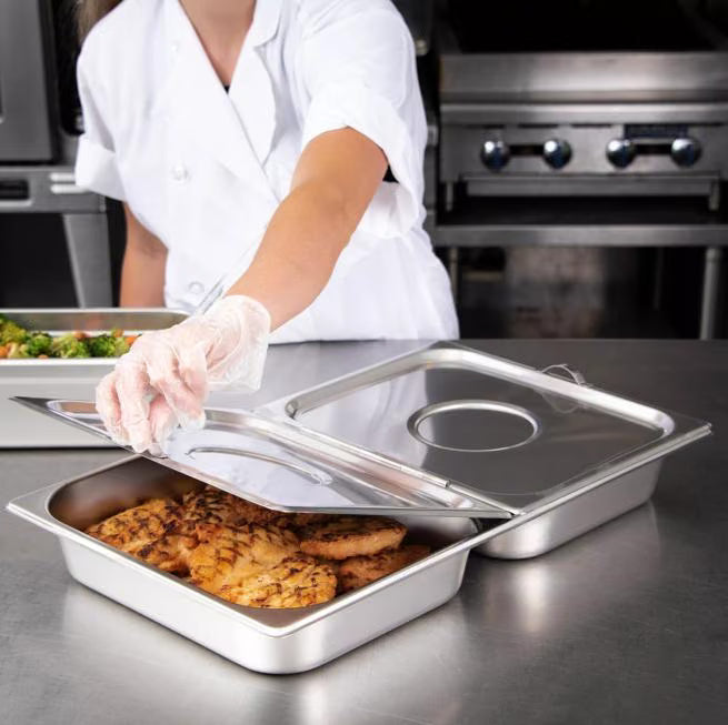 Cover and serve food efficiently with the DuraPan Stainless Steel Steam Table Hotel Pan Center Hinged Cover Full-Size 607000H. Features a durable heavy gauge stainless steel design, two-sided opening, and independent pull handles.