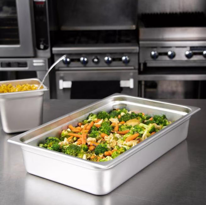 Prepare and serve food efficiently with the DuraPan Light Gauge Stainless Steel Steam Table Hotel Pan Full-Size 4 Inch Deep 607004. Features spoonable bottoms, freezer-to-oven versatility, and Coldmaster compatibility.