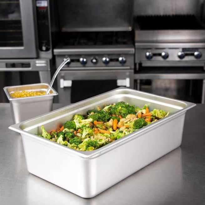 Prepare and serve food efficiently with the DuraPan Light Gauge Stainless Steel Steam Table Hotel Pan Full-Size 6 Inch Deep 607006. Features spoonable bottoms, freezer-to-oven versatility, and Coldmaster compatibility.