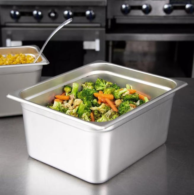 Prepare and serve food efficiently with the DuraPan Light Gauge Stainless Steel Steam Table Hotel Pan 1/2 Size 6 Inch Deep 607126. Features spoonable bottoms, freezer-to-oven versatility, and Coldmaster compatibility.