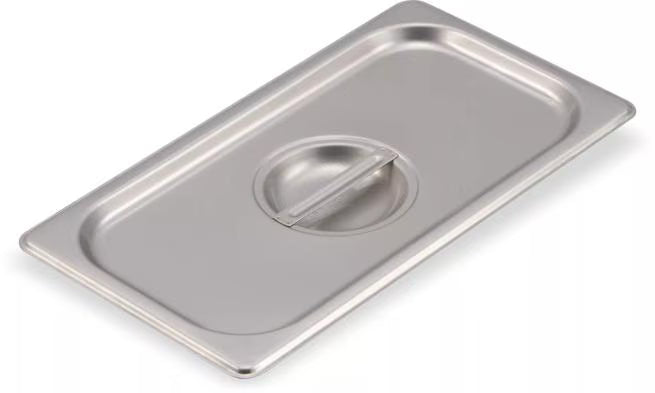Protect food with the DuraPan Stainless Steel Steam Table Hotel Pan Handled Cover 1/3 Size 607130C. Features heavy gauge stainless steel construction, a comfortable concave handle, and dishwasher-safe cleaning.