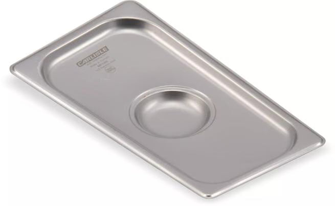 Protect food with the DuraPan Stainless Steel Steam Table Hotel Pan Handled Cover 1/3 Size 607130C. Features heavy gauge stainless steel construction, a comfortable concave handle, and dishwasher-safe cleaning.