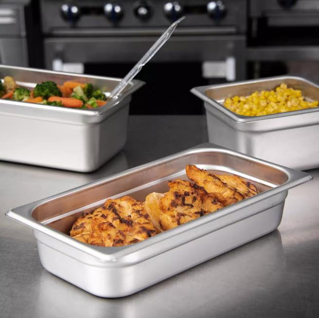Prepare and serve food efficiently with the DuraPan Light Gauge Stainless Steel Steam Table Hotel Pan 1/3 Size 2.5 Inch Deep 607132. Features spoonable bottoms, freezer-to-oven versatility, and Coldmaster compatibility.