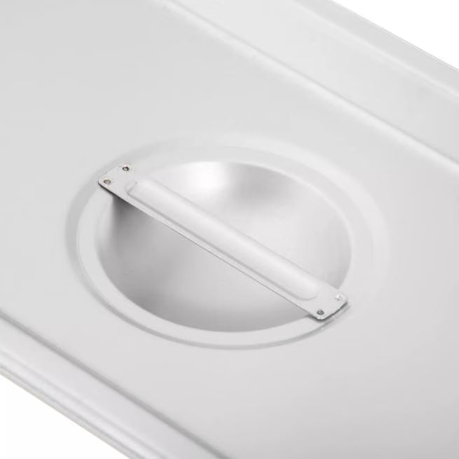 Protect food with the DuraPan Stainless Steel Steam Table Hotel Pan Handled Cover 1/4 Size 607140C. Features heavy gauge stainless steel construction and a comfortable concave handle.