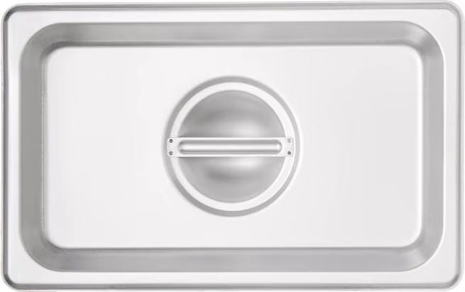 Protect food with the DuraPan Stainless Steel Steam Table Hotel Pan Handled Cover 1/4 Size 607140C. Features heavy gauge stainless steel construction and a comfortable concave handle.