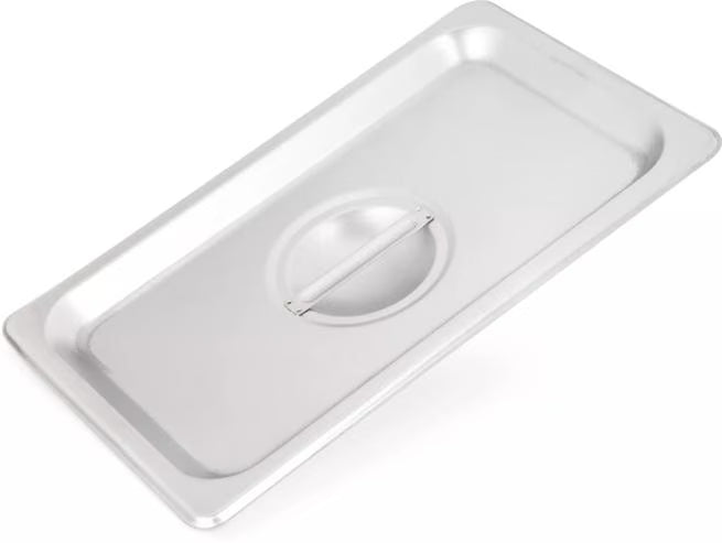 Protect food with the DuraPan Stainless Steel Steam Table Hotel Pan Handled Cover 1/4 Size 607140C. Features heavy gauge stainless steel construction and a comfortable concave handle.