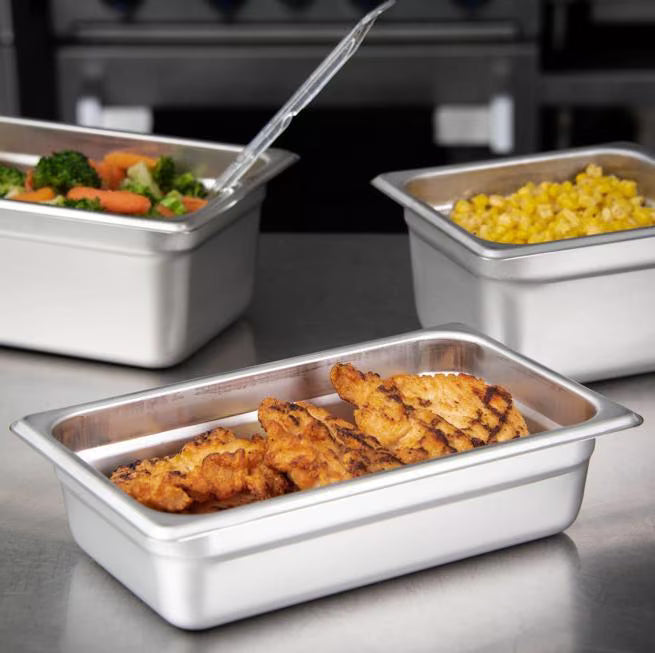 Prepare and serve food efficiently with the DuraPan Light Gauge Stainless Steel Steam Table Hotel Pan 1/4 Size 2.5 Inch Deep 607142. Features spoonable bottoms, freezer-to-oven versatility, and Coldmaster compatibility.