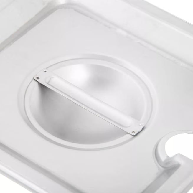 Protect and serve food efficiently with the DuraPan Stainless Steel Hotel Pan Slotted Handled Cover 1/6 Size 607160CS. Features heavy gauge stainless steel, a serving spoon notch, and a comfortable concave handle.
