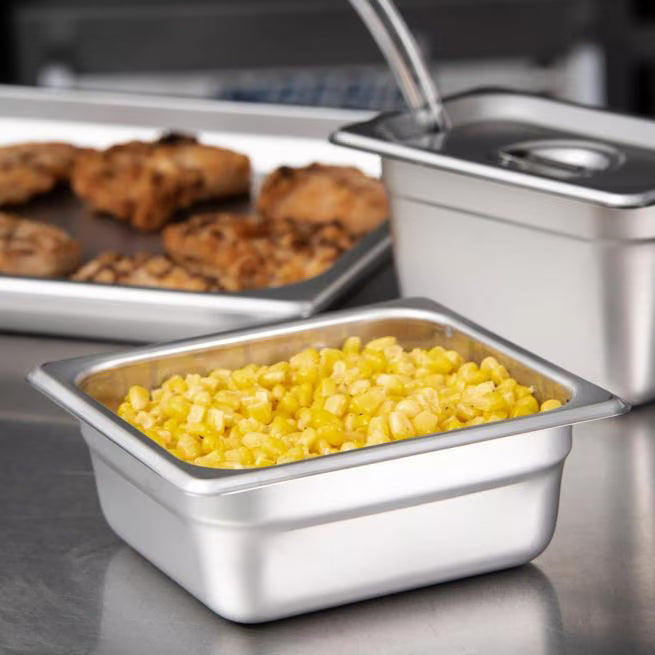 Prepare and serve food efficiently with the DuraPan Light Gauge Stainless Steel Steam Table Hotel Pan 1/6 Size 2.5 Inch Deep 607162. Features spoonable bottoms, freezer-to-oven versatility, and Coldmaster compatibility.