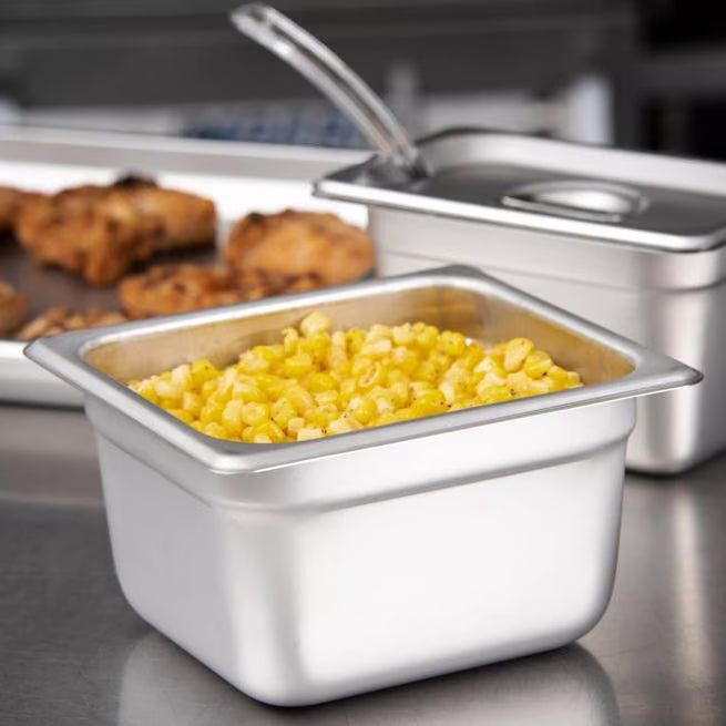 Prepare and serve food efficiently with the DuraPan Light Gauge Stainless Steel Steam Table Hotel Pan 1/6 Size 4 Inch Deep 607164. Features spoonable bottoms, freezer-to-oven versatility, and Coldmaster compatibility.