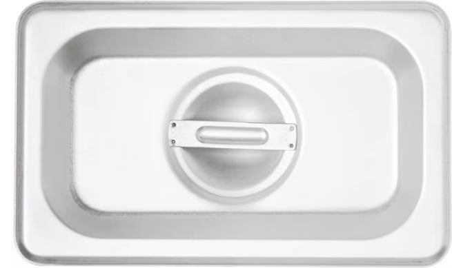 Protect food with the DuraPan Stainless Steel Steam Table Hotel Pan Handled Cover 1/9 Size 607190C. Features heavy gauge stainless steel construction and a comfortable concave handle.