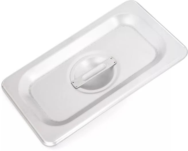 Protect food with the DuraPan Stainless Steel Steam Table Hotel Pan Handled Cover 1/9 Size 607190C. Features heavy gauge stainless steel construction and a comfortable concave handle.