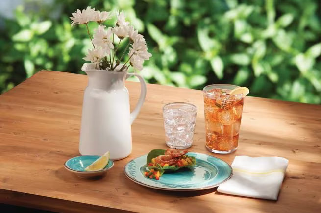 Serve meals with style using the 5400115 Aqua Melamine Dinner Plate. This 11 Inch break resistant plate features a rustic pottery inspired design, making it ideal for restaurants, catering, buffets, and home dining.