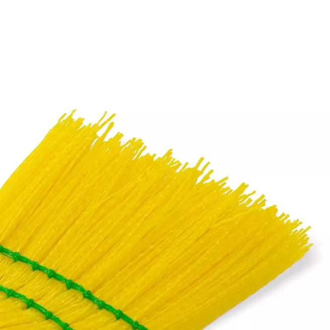 9 Inch Yellow Synthetic Corn Whisk with chemical and liquid resistant bristles that withstand temperatures up to 225°F. X shaped bristles provide superior sweeping on carpets, entry mats and hard floors.