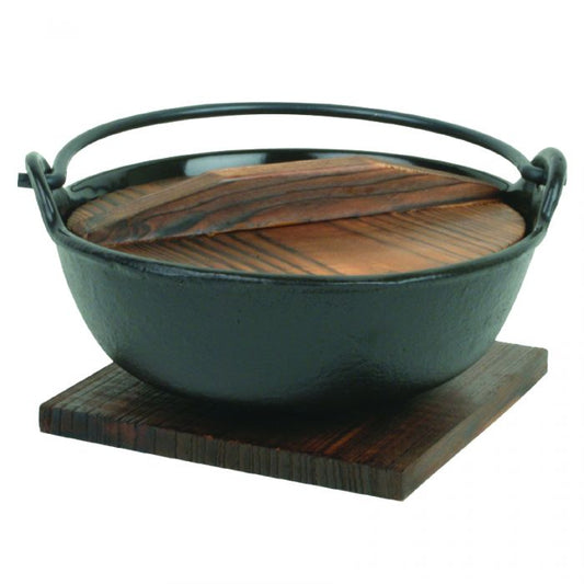 blends traditional aesthetics with practical functionality to elevate the dining experience. With a 24 oz capacity, this round cast iron bowl is perfect for serving noodles, soups, and stews. Designed with a swing handle for ease of transport and serving, it includes a wooden lid and base that help retain heat and add rustic charm. This bowl is ideal for restaurants seeking to create an authentic Japanese ambiance, as well as for home kitchens looking to combine durability with cultural appeal.