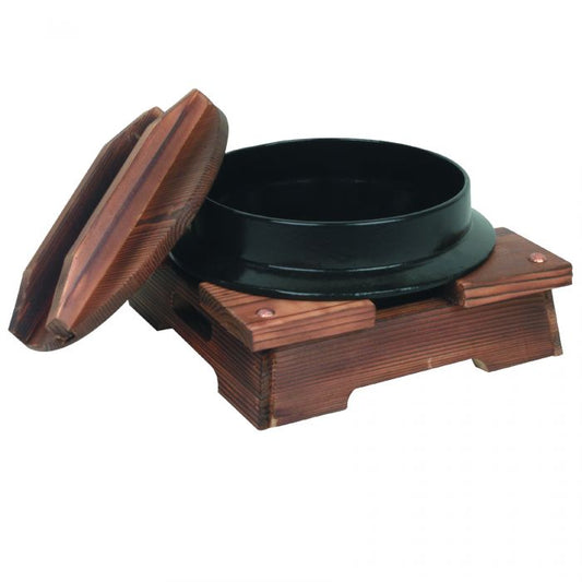 Thunder Group Nabemono Bowl blends traditional aesthetics with practical functionality to elevate the dining experience. With a 40 oz capacity, this round cast iron bowl is perfect for serving noodles, soups, and stews. Designed with a swing handle for ease of transport and serving, it includes a wooden lid and base that help retain heat and add rustic charm. 