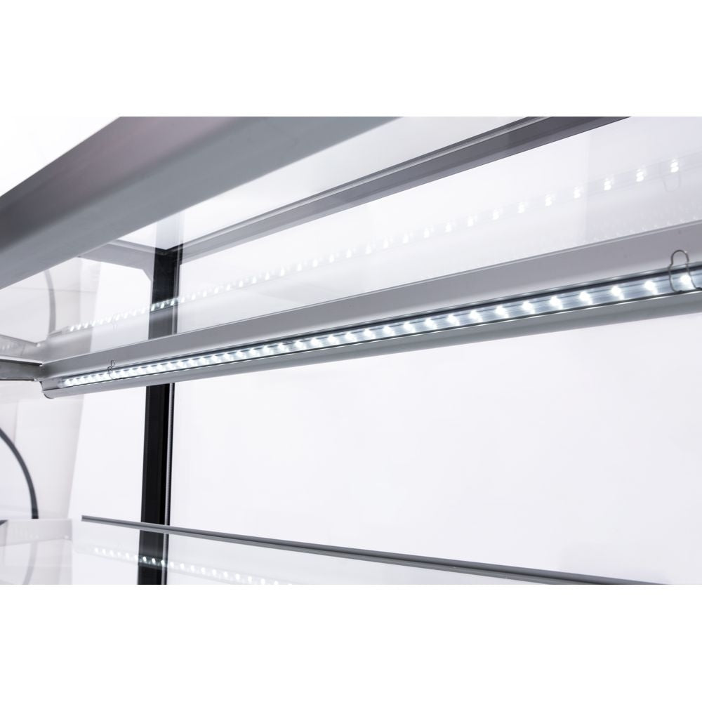 The Marchia MB48-W 48-inch Curved Glass Refrigerated Bakery Display Case in white, designed to showcase a variety of pastries, cakes, and desserts while keeping them fresh and at the perfect temperature. Ideal for bakeries, cafés, and delis.