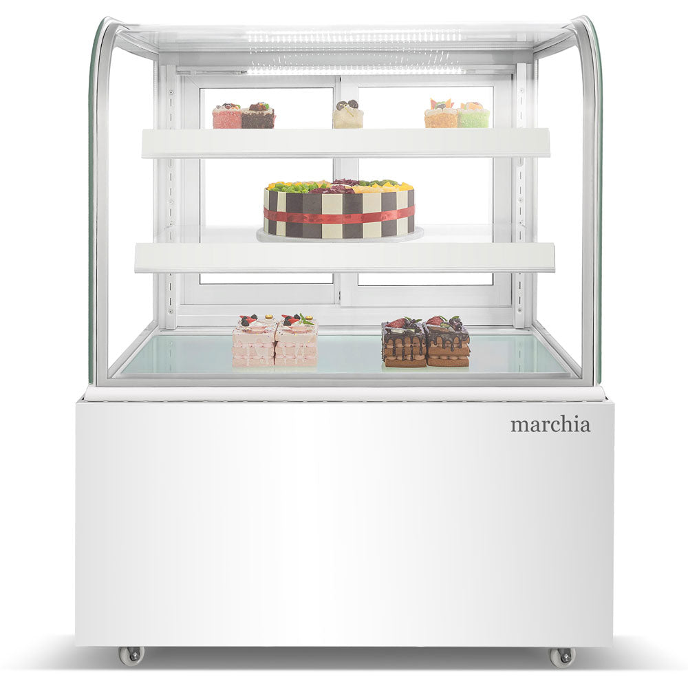 The Marchia MB48-W 48-inch Curved Glass Refrigerated Bakery Display Case in white, designed to showcase a variety of pastries, cakes, and desserts while keeping them fresh and at the perfect temperature. Ideal for bakeries, cafés, and delis.