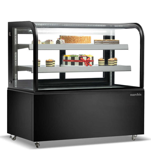 The Marchia MB48 48-inch Curved Glass Refrigerated Bakery Display Case in stainless steel, designed to elegantly display a variety of baked goods, pastries, and desserts while maintaining optimal freshness. Ideal for bakeries, cafés, and delis.